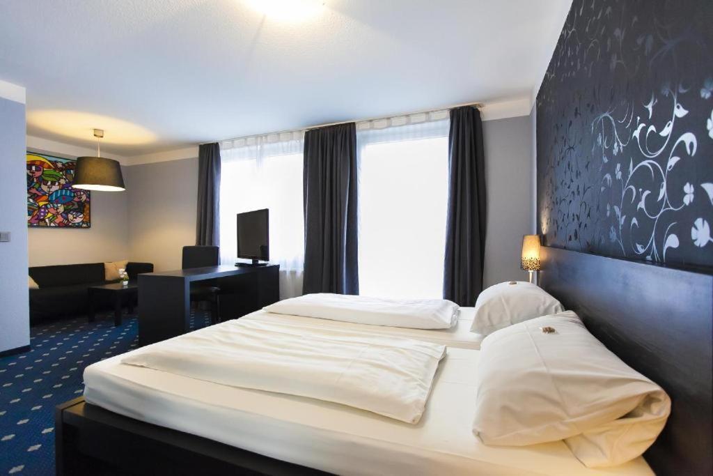 לנגנפלד Hotel Am Berliner Platz מראה חיצוני תמונה